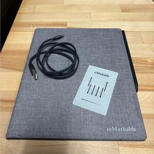 reMarkable 2 Tablet with Case, Charger, Pencil, and Spare Tips.